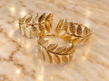 Anillos de servilleta de hojas doradas · Set de 4